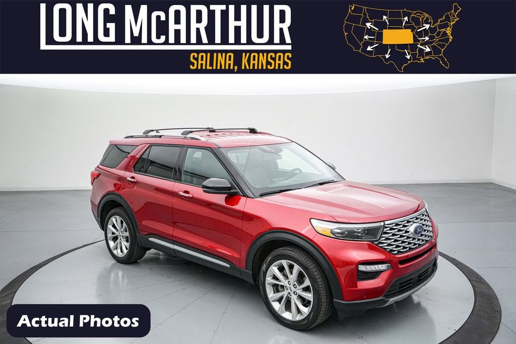2023 Ford Explorer Platinum in Rapid Red Metallic Tinted Clearcoat — front three-quarter view