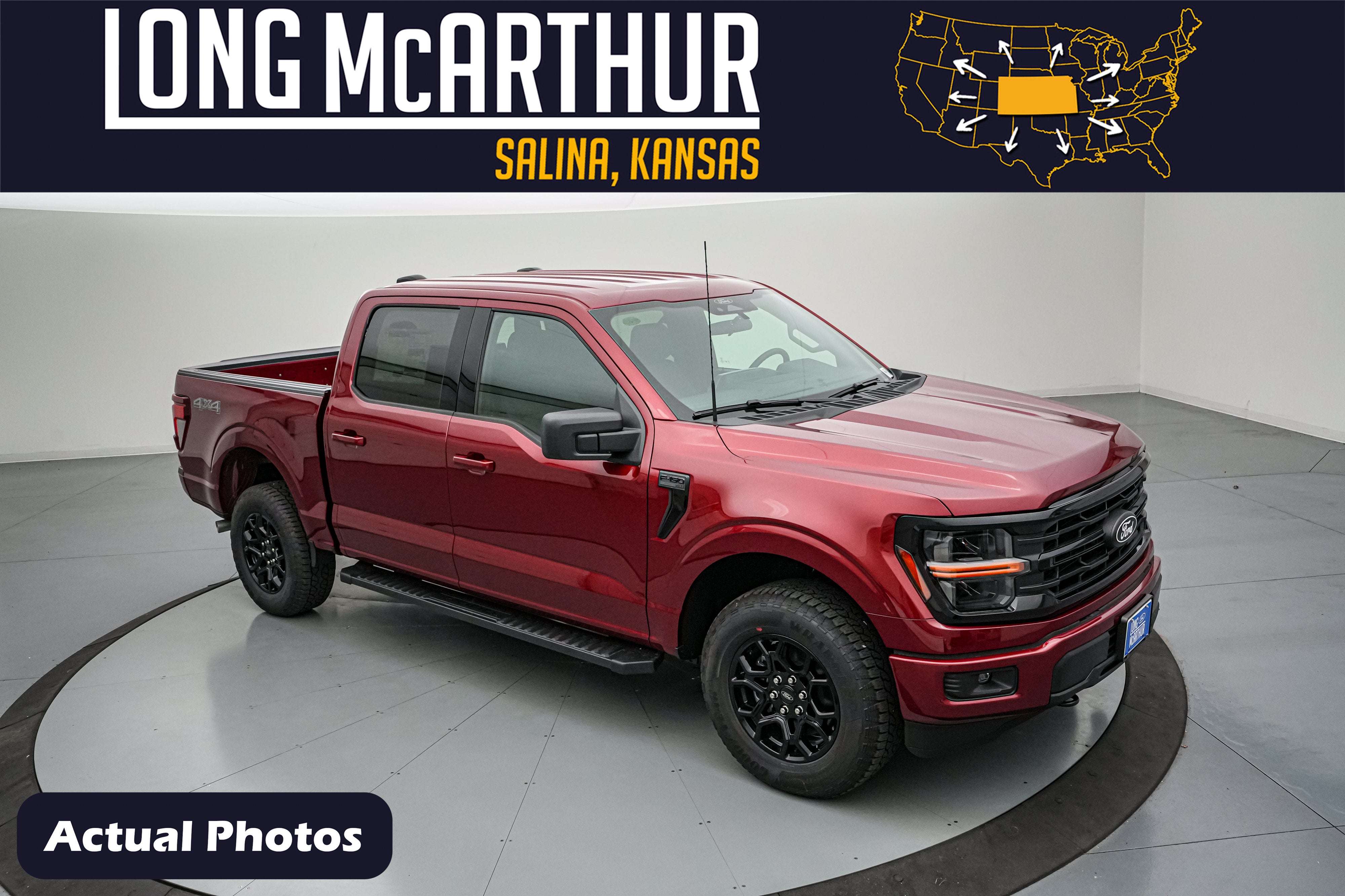 2026 Ford F-150 XLT in Ruby Red Metallic Tinted Clearcoat — front three-quarter view