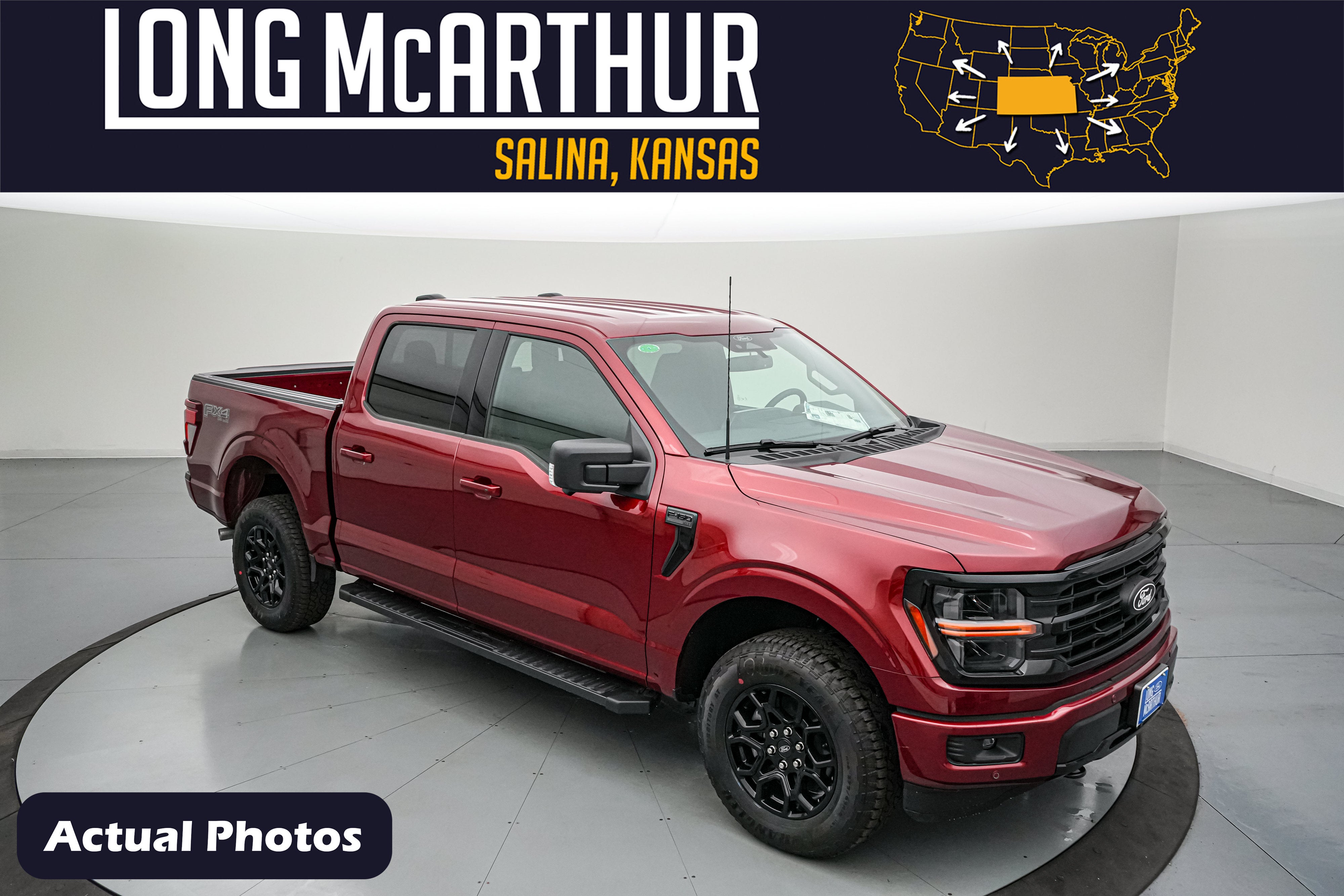 2026 Ford F-150 XLT in Ruby Red Metallic Tinted Clearcoat — front three-quarter view