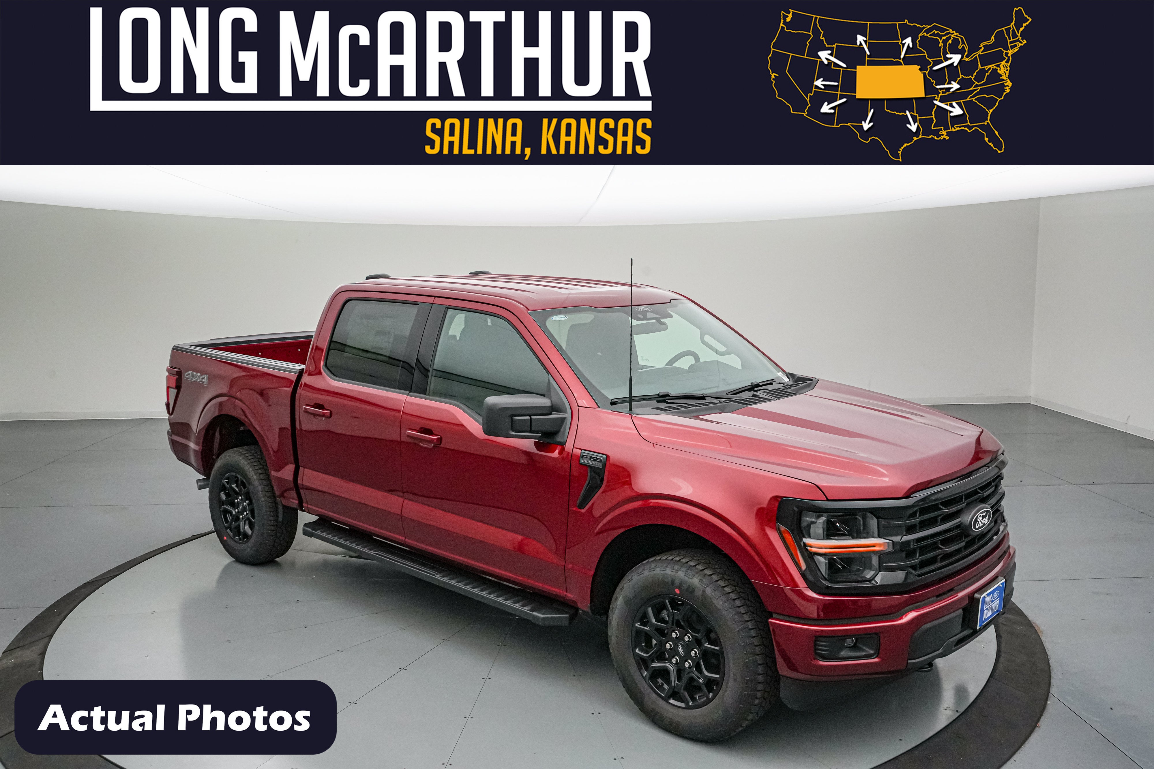 2026 Ford F-150 XLT in Ruby Red Metallic Tinted Clearcoat — front three-quarter view