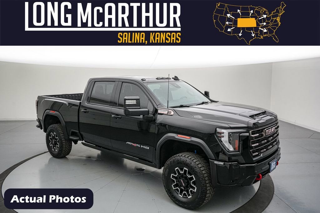 2025 GMC Sierra 2500HD AT4X in Onyx Black — front three-quarter view