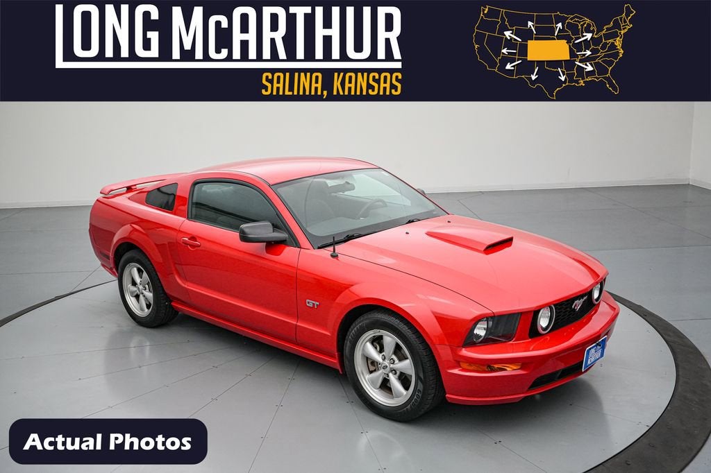 2007 Ford Mustang GT Deluxe in Torch Red Clearcoat — front three-quarter view