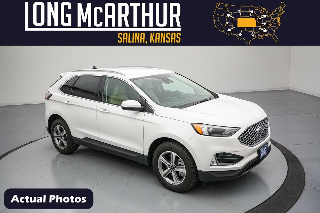 2024 Ford Edge SEL in Star White Metallic Tri-Coat — front three-quarter view