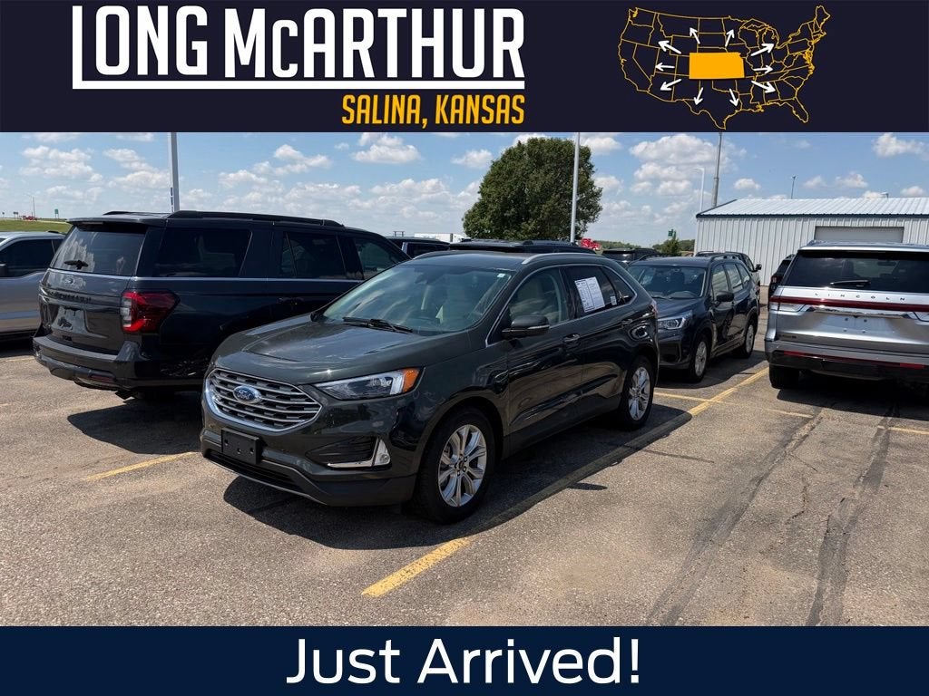 2024 Ford Edge Titanium in Forged Green Metallic — front three-quarter view