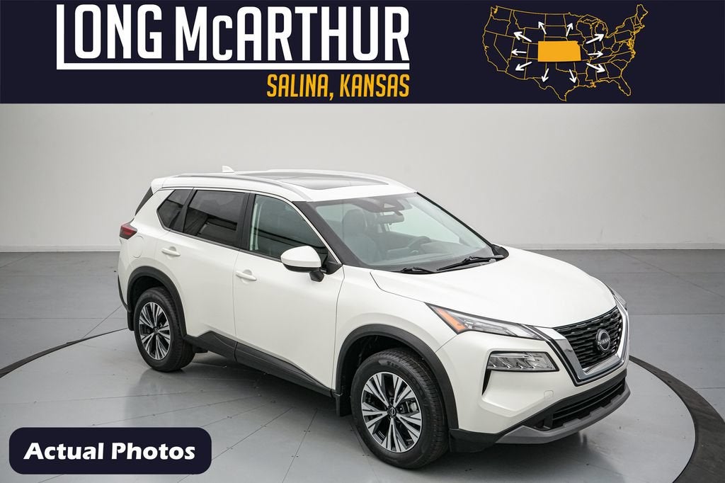 2023 Nissan Rogue SV in Pearl White Tricoat — front three-quarter view