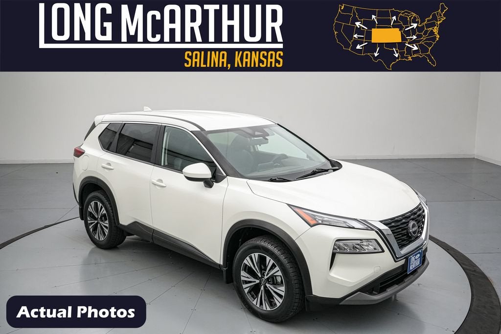 2023 Nissan Rogue SV in Pearl White Tricoat — front three-quarter view